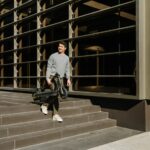 ninebot-kickscooter-max-g2-lifestyle-picture-carry-and-fold-2140×1427-72